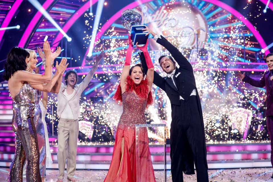 Ellie Leach lifting the coveted Glitterball trophy after her win on Saturday with Vito Coppola