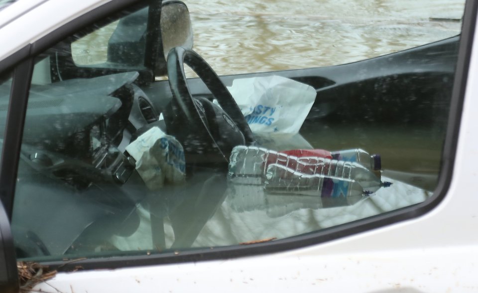 Water fills a van after it's abandoned in Buttsbury, Essex, on Sunday