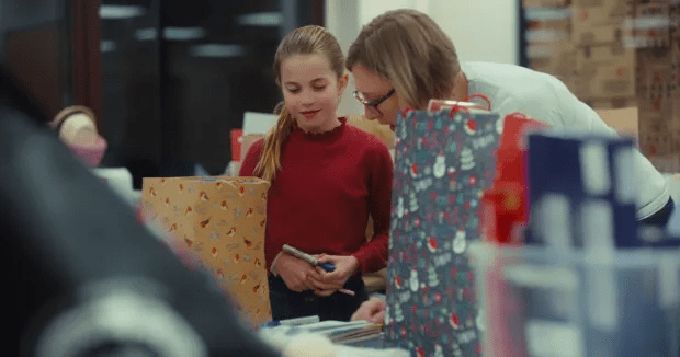 Prince Charlotte was seen writing labels for Christmas gifts