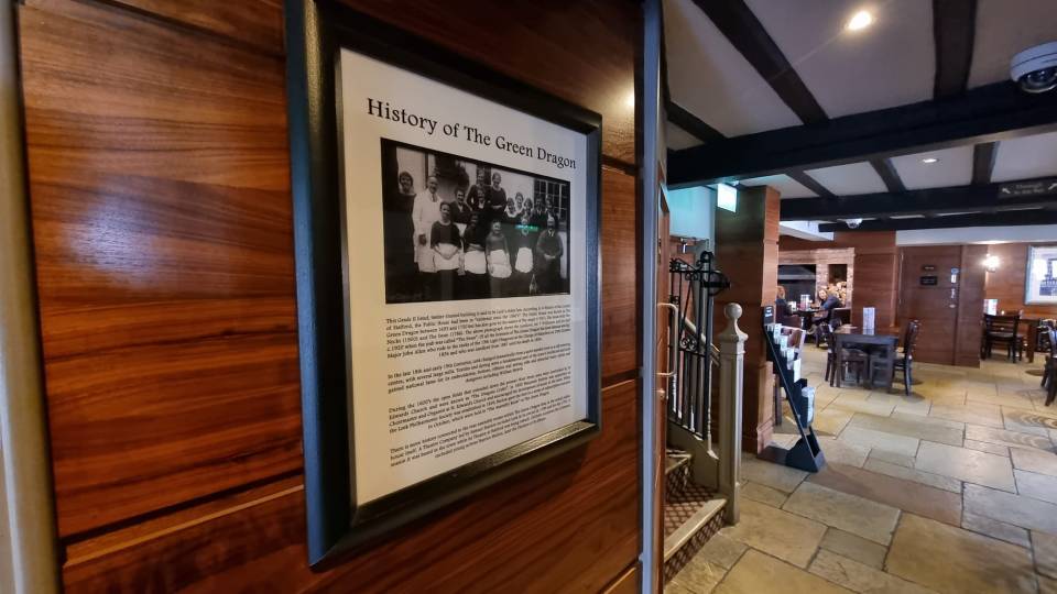 A history of The Green Dragon hangs on its wall