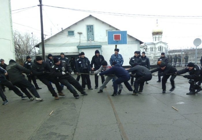 Prisoners and guards at the Polar Wolf jail