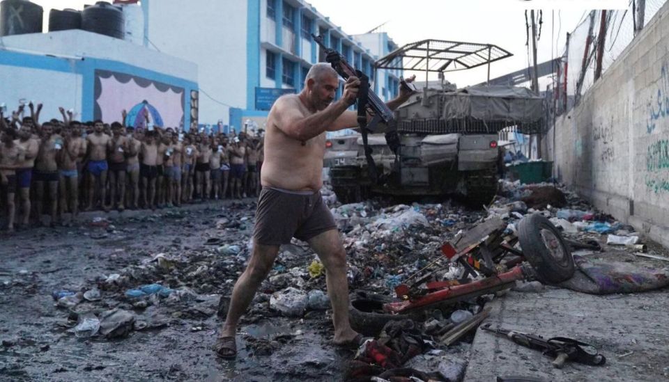 The footage apparently shows Hamas fighters surrendering weapons in Gaza