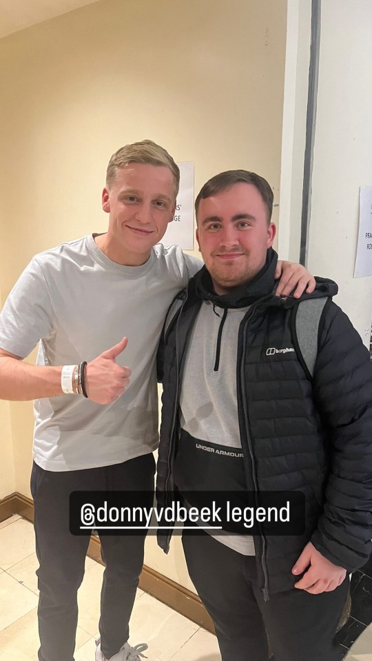 Littler posed for a photo with Donny van de Beek after the win