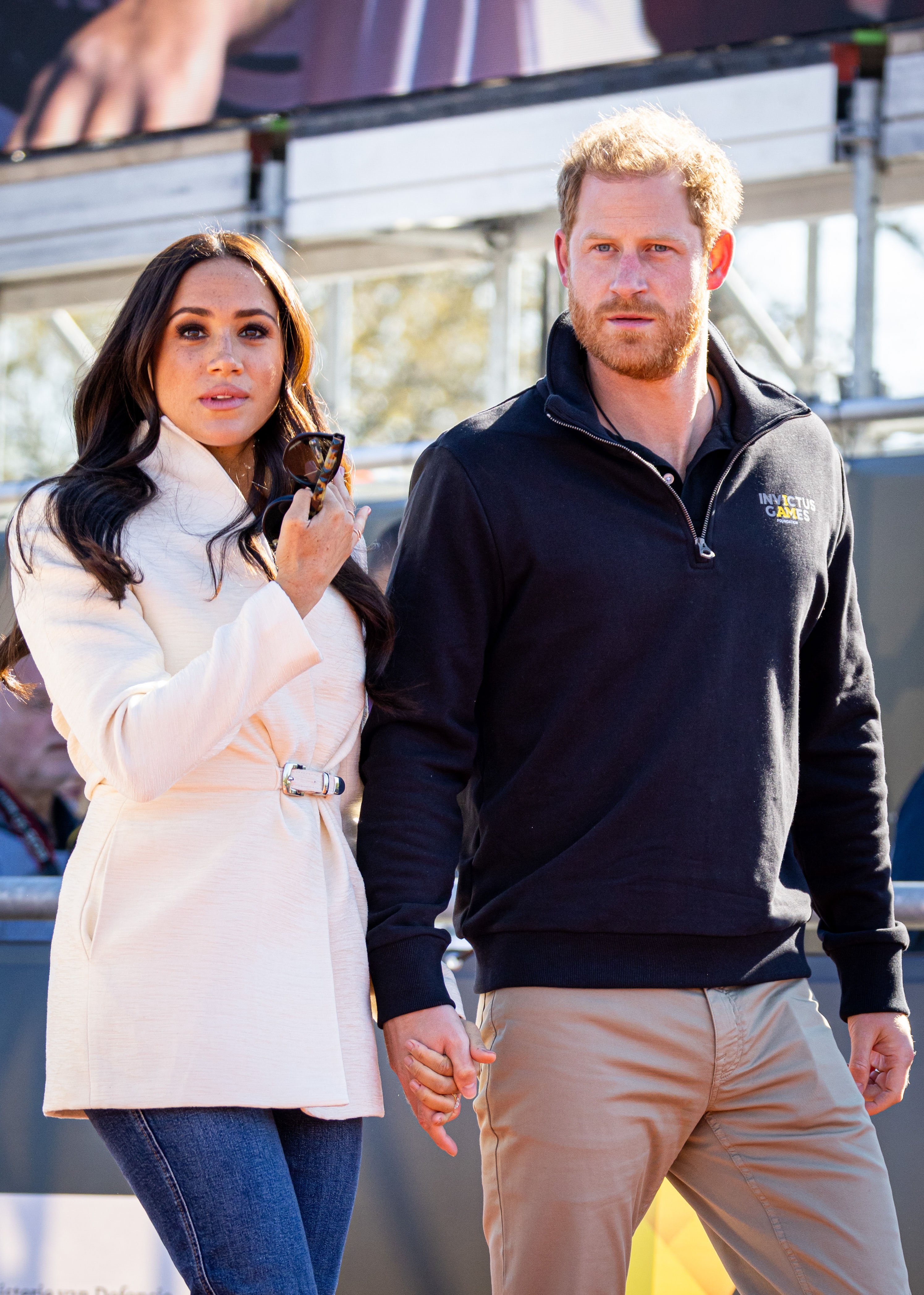 A source said Harry and Meghan have been urged to speak out in support of their family