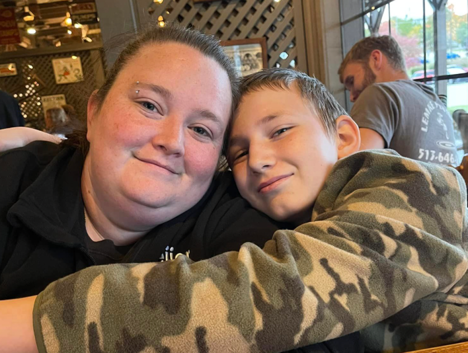 William McCarren - pictured with his mum Mollee Campbell - was rushed to hospital after coming home from school clutching his chest and struggling to breathe