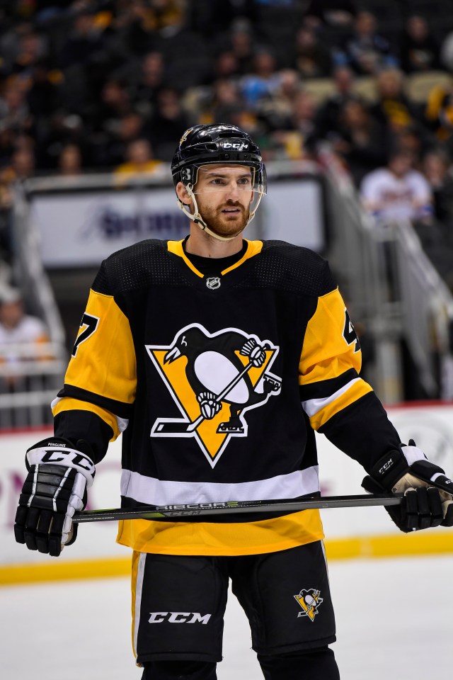 Adam Johnson in action for the Pittsburgh Penguins while playing in the NHL