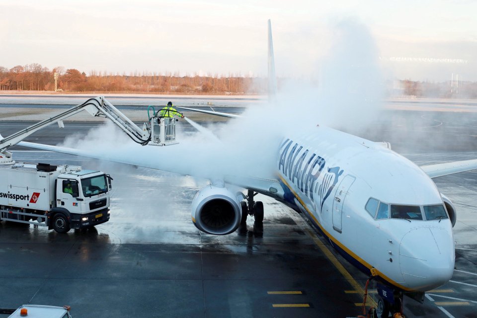 A plane being de-iced at Edinburgh Airport as temperatures dip below -3C in the Scottish capital