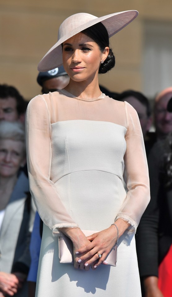 Meghan pictured wearing the Bentley & Skinner tennis bracelet in May 2018