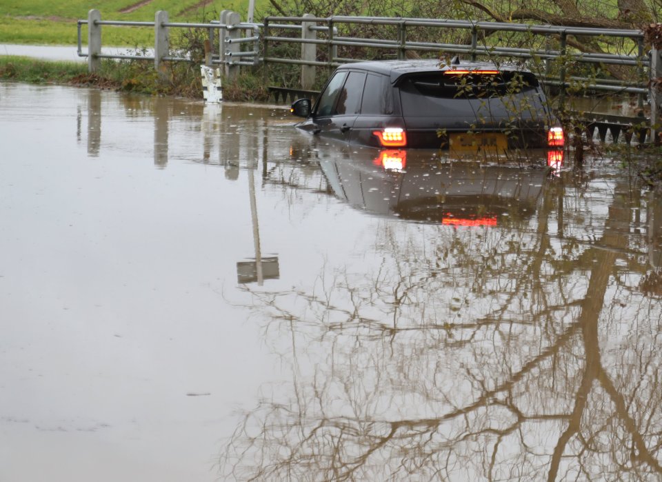 Nearby, a Range Rover believed to be carrying a young child was caught in four feet of water as Storm Elin sparked havoc