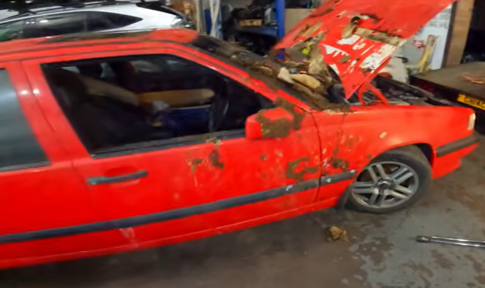 An extremely rare and high performance Volvo 850 R was found after 24 years in an abandoned collapsed barn and was left in an awful state