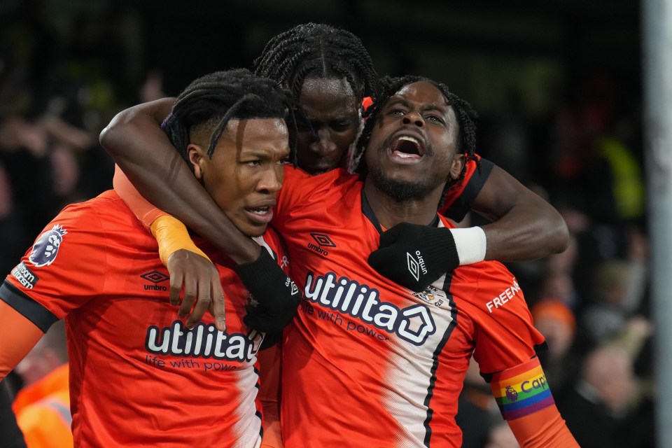 Luton scorers Gabe Osho and Elijah Adebayo rejoice with Pelly Ruddock Mpanzu