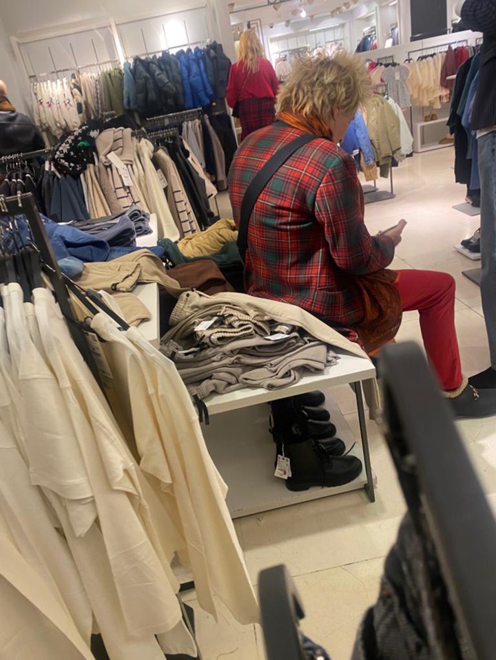 Sir Rod Stewart took a seat as wife Penny tried on clothes in Zara on London’s Oxford Street