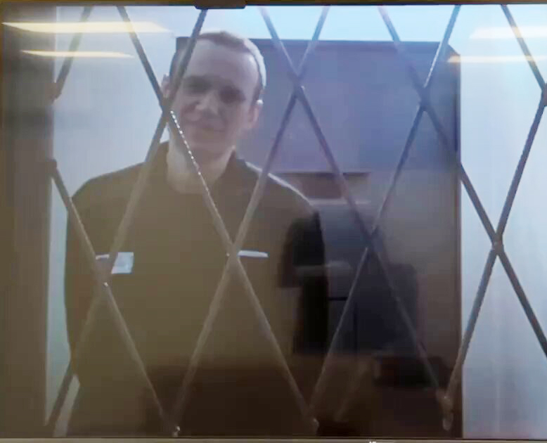 The last picture of Navalny behind bars in Russia - appearing via video link in court yesterday