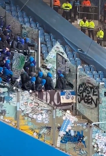 Fans kicked through the glass divider