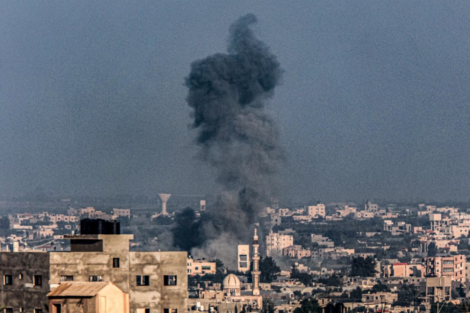 Smoke billows in the southern Gaza Strip on Christmas Eve