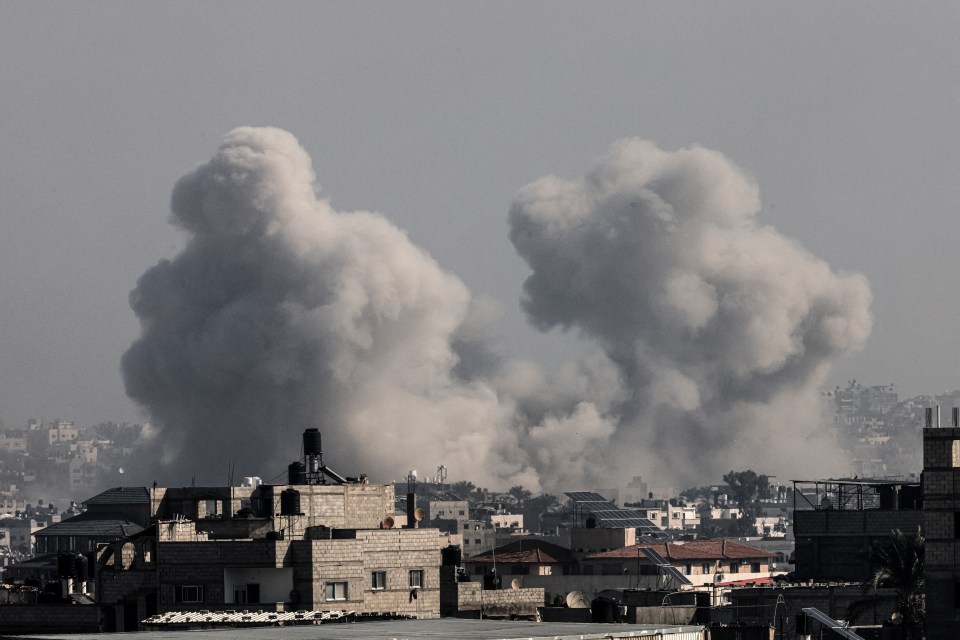 Smoke billows over Khan Younis during Israeli bombardment on December 17, 2023