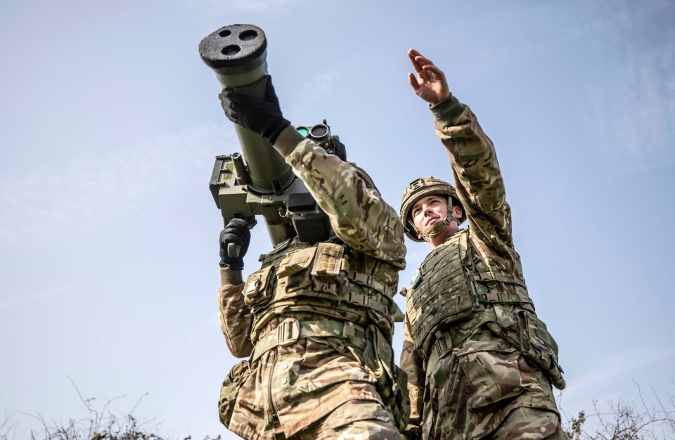 Soldiers of 7 Air Defence Group hold a Starstreak anti air missile during a demonstration at their barracks in Emsworth