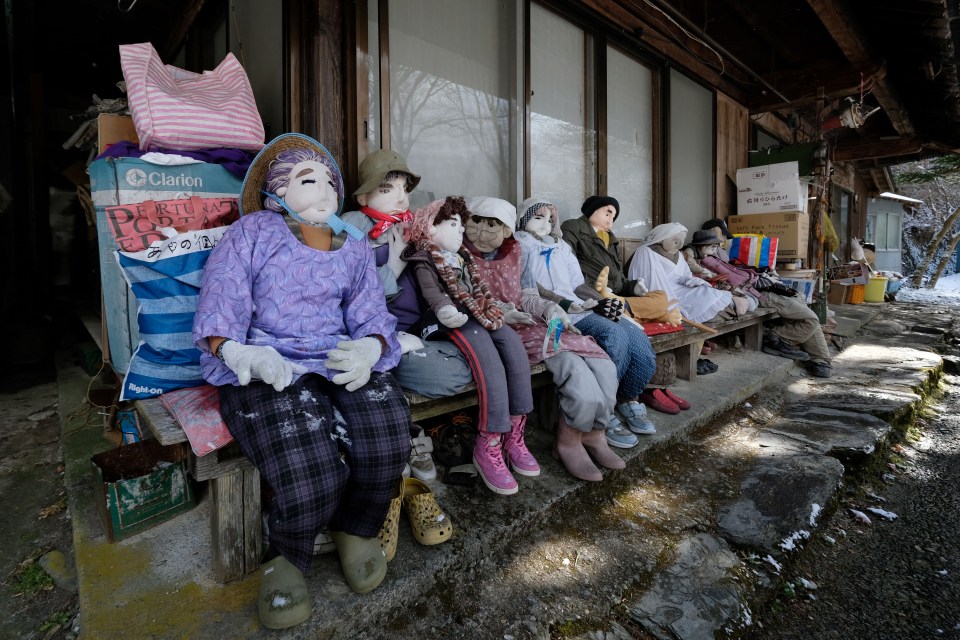 The 350 life-size dolls can be found all around the village