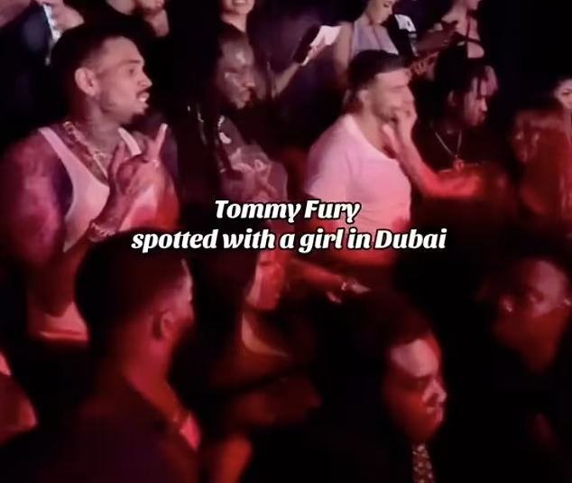 Problems appeared to begin after Tommy was photographed partying in Dubai, including one snap that showed a woman grabbing his face