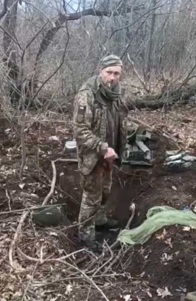 The scene of horror, where Oleksandr was forced to dig his own grave before being shot by a hail of bullets just seconds after this still from the video