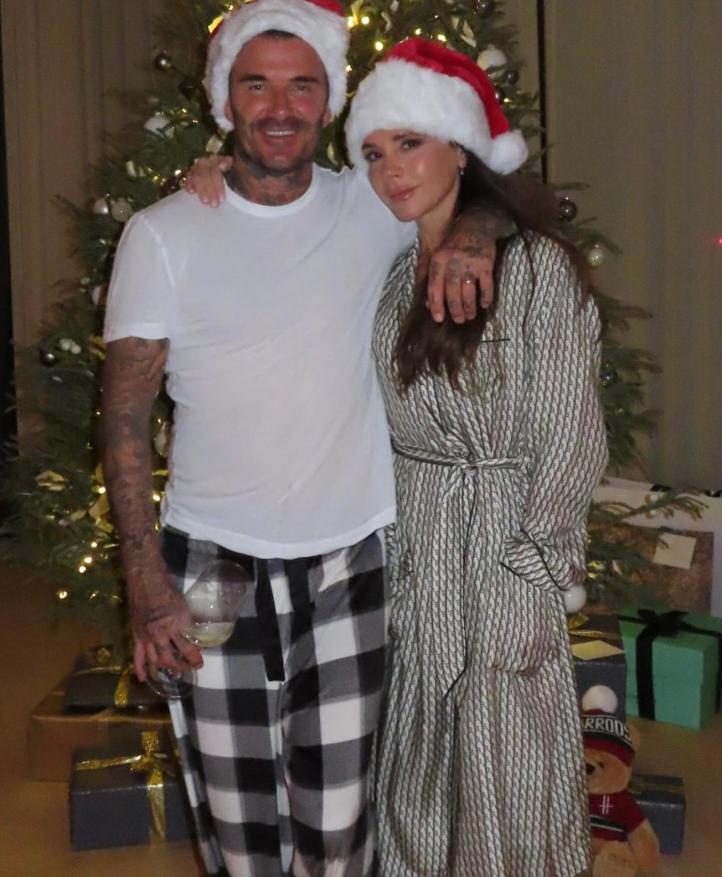 David and Victoria posed with their Santa hats