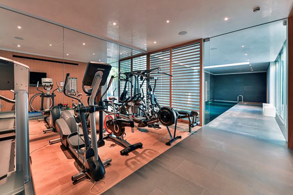 The home is equipped with a gym and indoor swimming pool