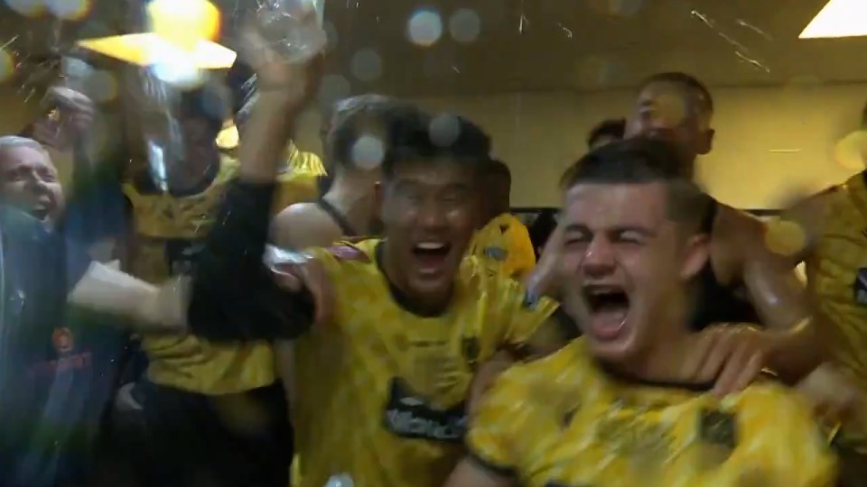 Maidstone's stars celebrate in the dressing room afterwards