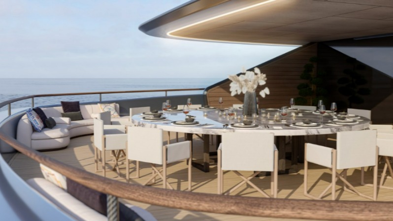 An outdoor dining space sits on the upper deck, ideal for large gatherings