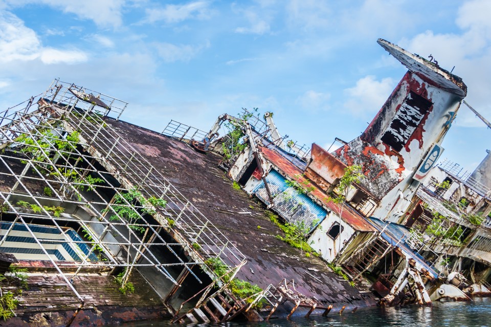 MS World Discoverer is a half-sunken ocean liner which sits in the Solomon Islands