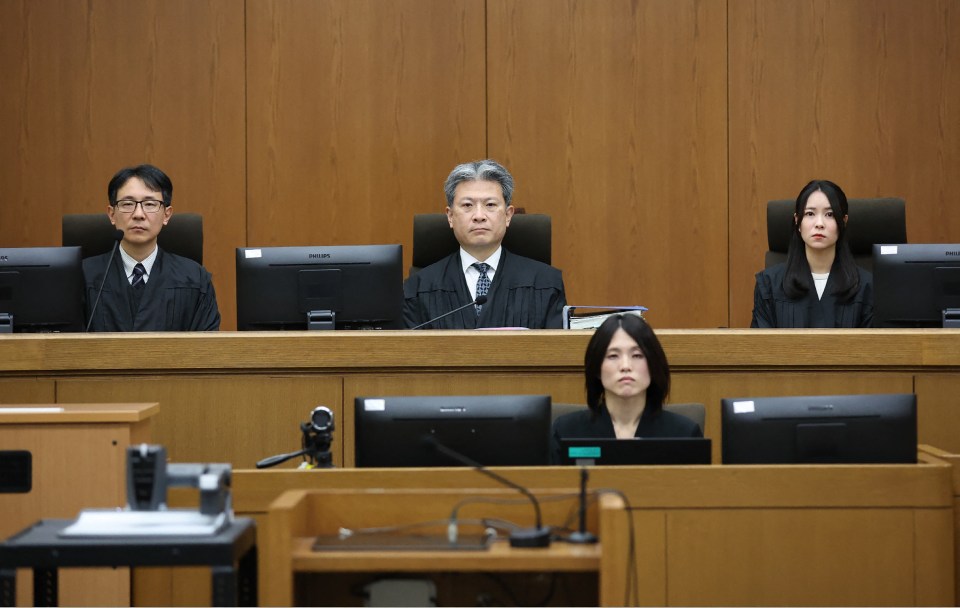 Judge Keisuke Masuda (pictured top centre) handed down the death sentence today