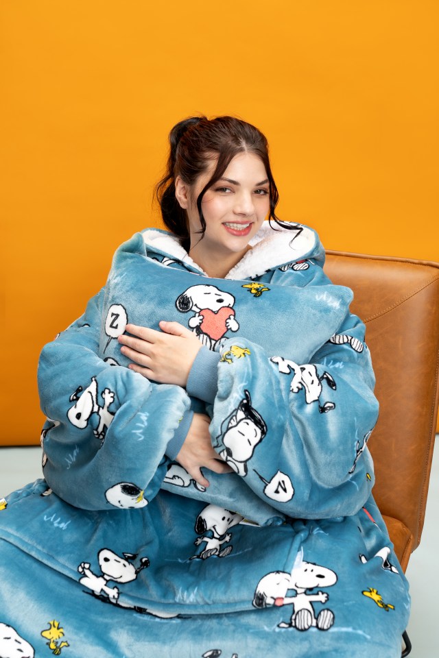 The Snoopy Oodie comes with a special-edition cushion case.