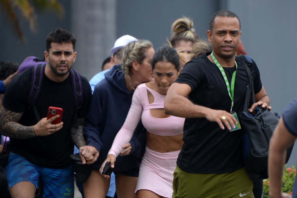 Terrified people running for safety after gunmen raided the University of Guayaquil