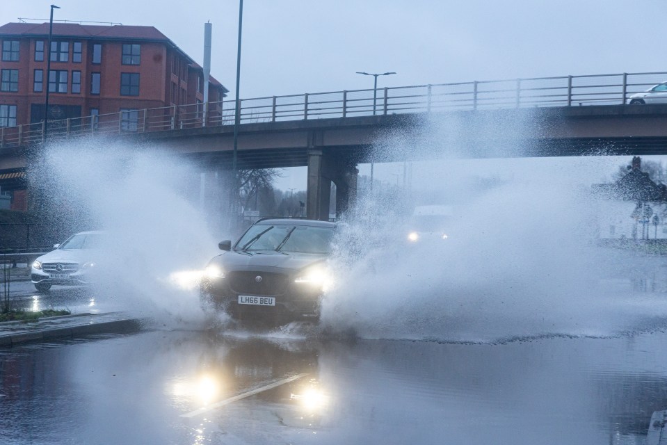 Drivers faced flooding and spray while travelling in south-west London today