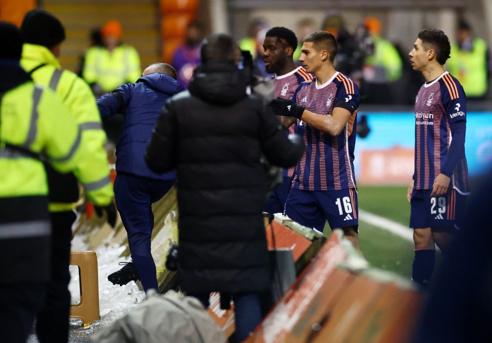 Players spotted the calls for help from the away end and notified the official