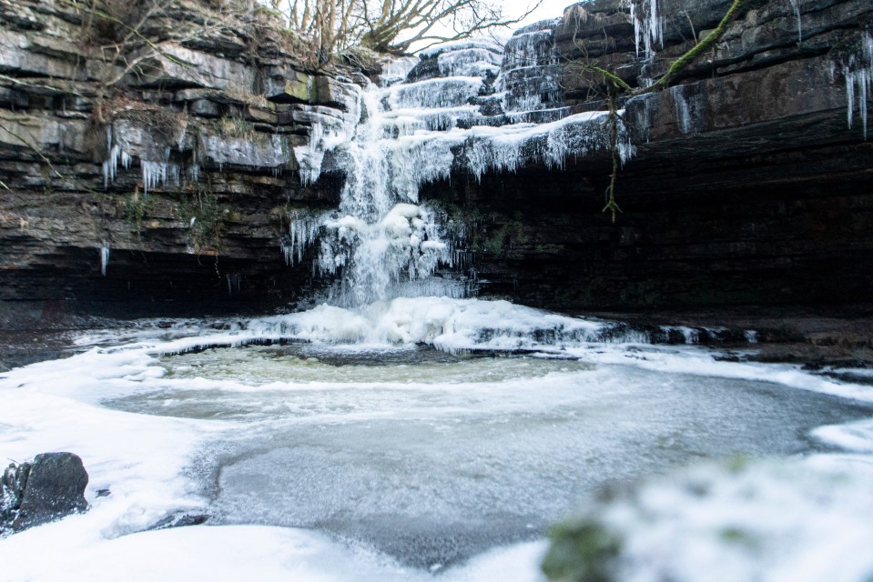 A waterfall in County Durham partially frozen after temperatures plummeted overnight