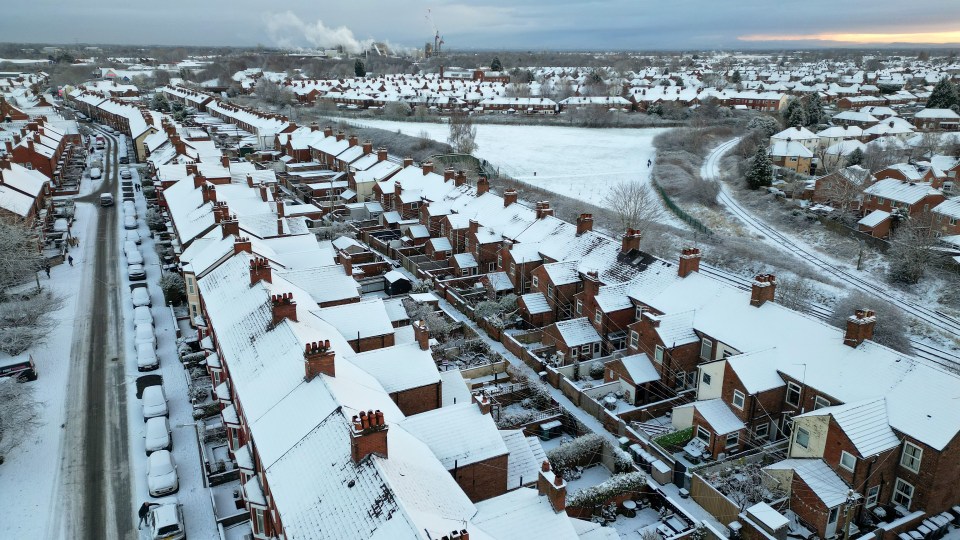 Rooftops in Northwich, Cheshire, were covered in snow yesterday morning