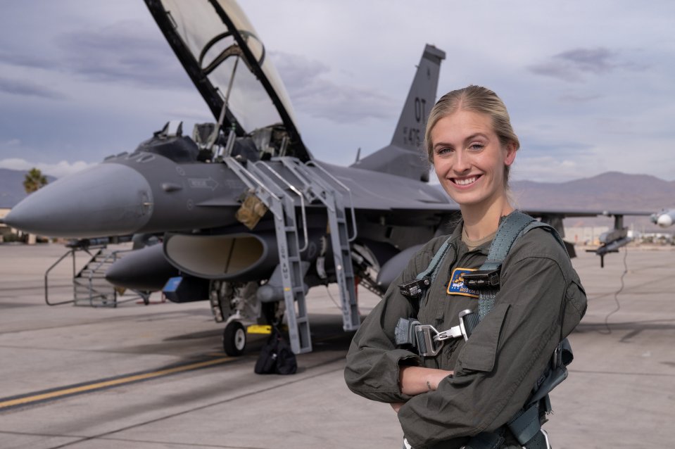 Madison's day job involves training at the controls of an F-16 fighter jet