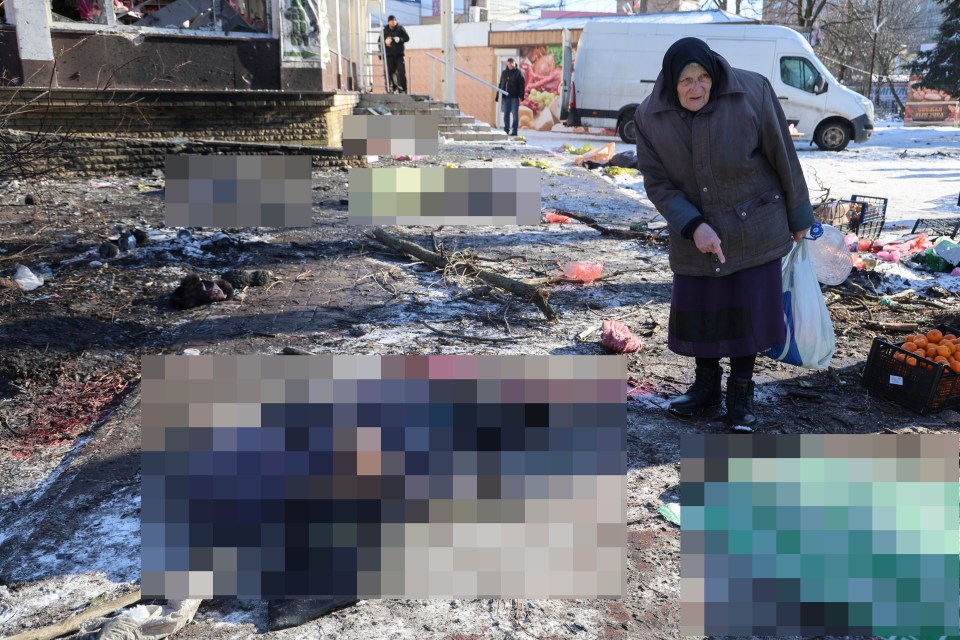 Bodies could be seen lying on blood-soaked snow near one of the city's markets