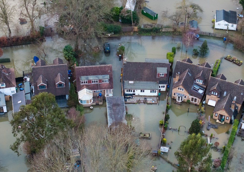 Some 2,000 homes in England have been flooded, ministers say