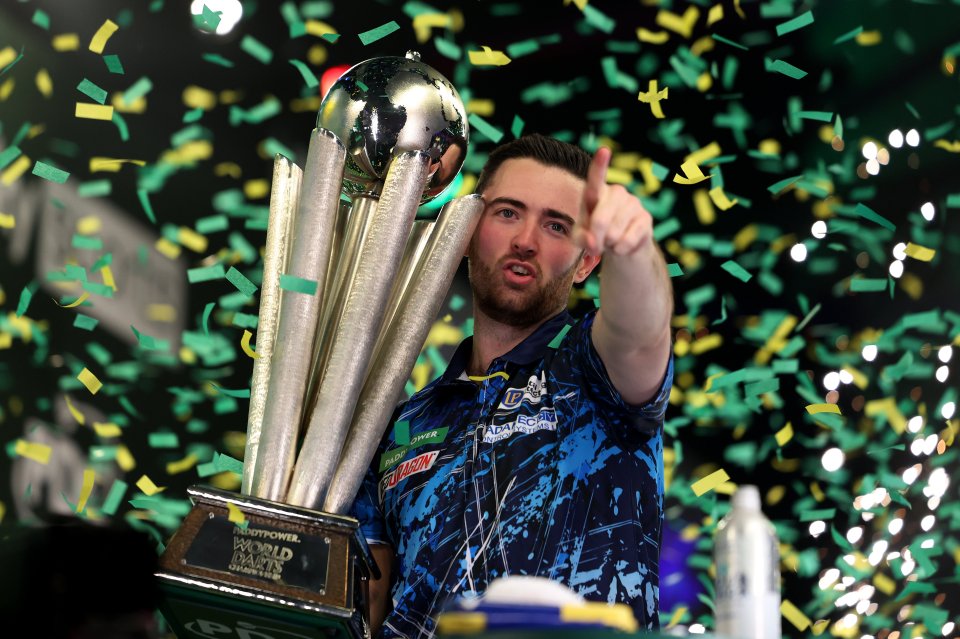 Luke Humphries celebrates with The Sid Waddell Trophy