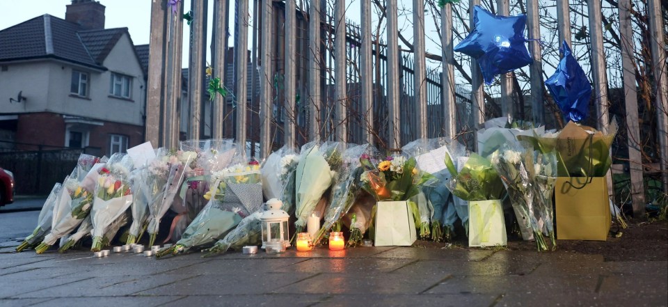 Floral tributes have been left near the scene