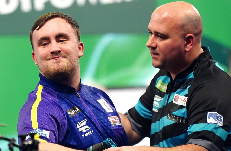 Rob Cross, right, was beaten by Luke Littler, left, in the world championship semi-finals