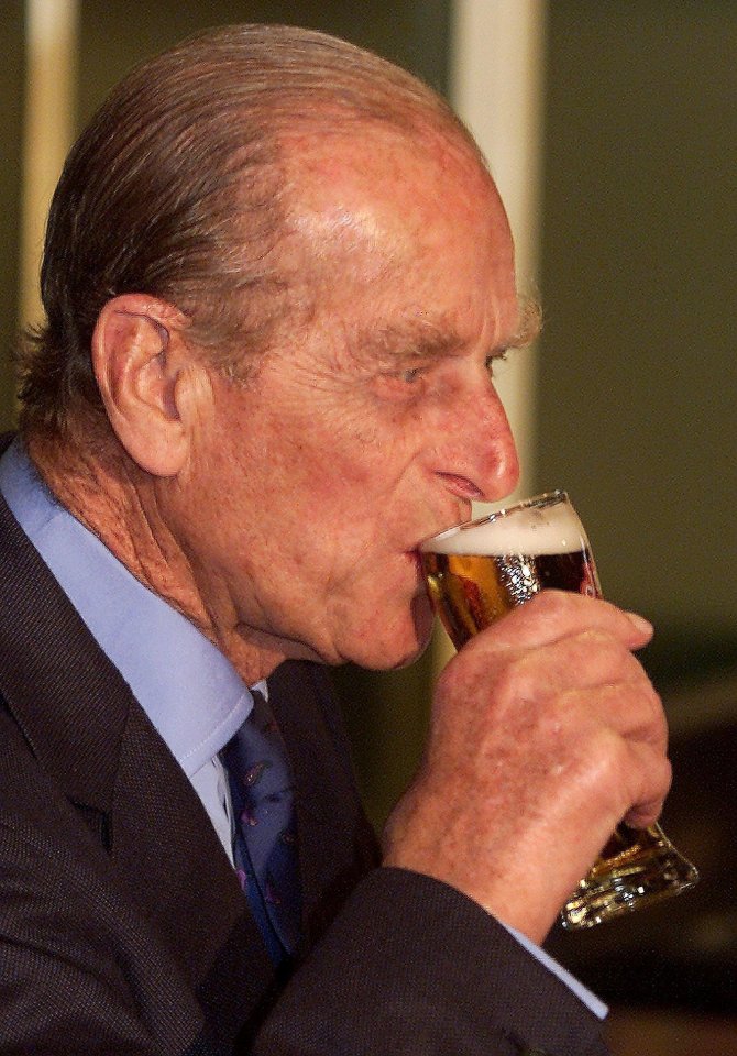 The Duke of Edinburgh tastes the local brew while touring the local beer manufacturer 'Boags' in Launceston, 29 March 2000. The Queen and Duke while visiting Tasmania as part of their Australian tour, also visited an unemployment work scheme as well as watching a sheep shearing demonstration. (ELECTRONIC IMAGE) AFP PHOTO/William WEST