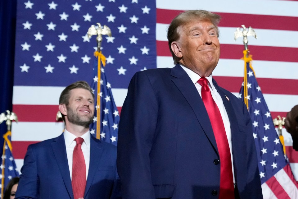 Republican presidential candidate former President Donald Trump stands on stage at a caucus night party in Des Moines, Iowa, Monday, Jan. 15, 2024. (AP Photo/Andrew Harnik)