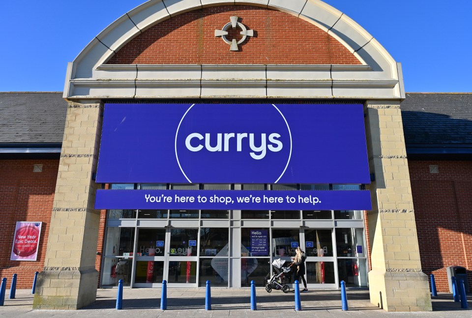 Currys has cashed in on sales of appliances and extras, as cash-strapped customers have not replaced older TVs and PCs