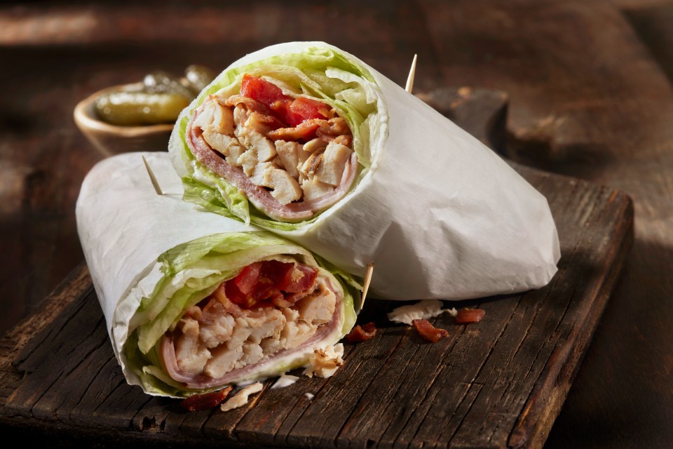 Choose a wholemeal wrap with plenty of salad vegetables as a healthier lunch option