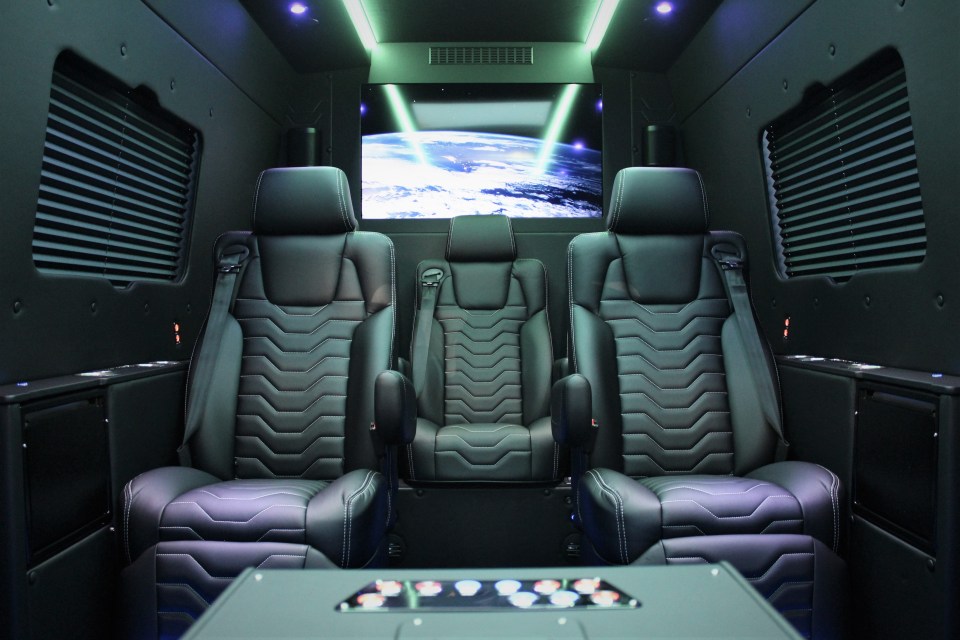 But a peak behind the door reveals an ultra-luxurious giant limo