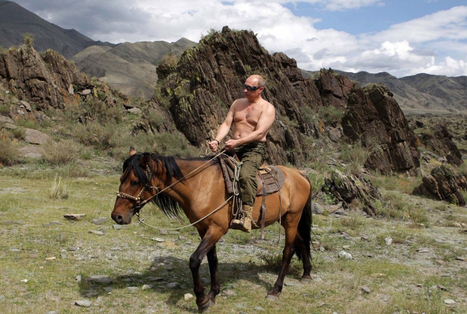 Khavinson once described this photo of Putin as 'wonderful' and 'what a man should look like'