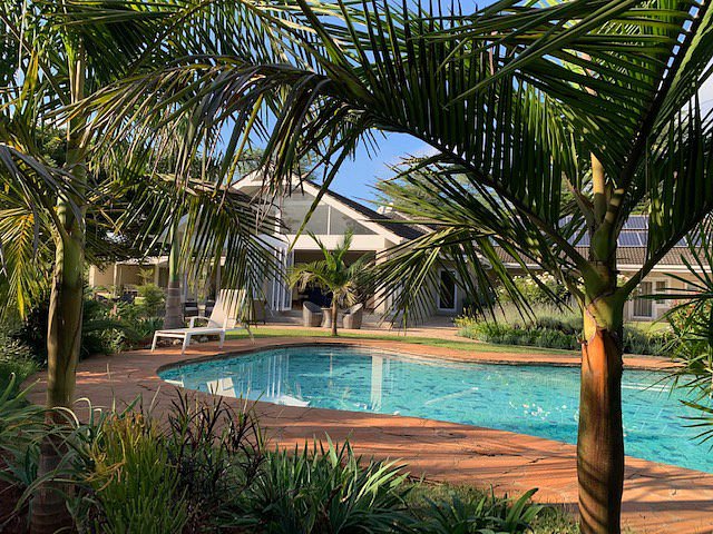 The poolside area is the perfect spot to relax