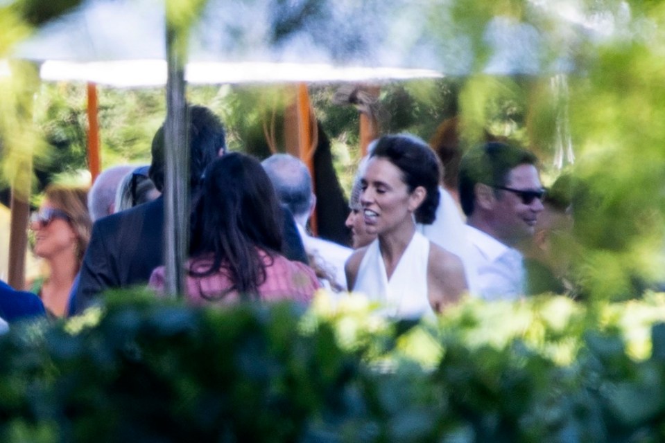 Jacinda's wedding ceremony took place under a clump of trees at the vineyard